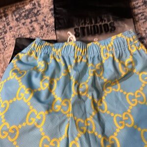 Bravest Studios Blue and Yellow Athletic Shorts